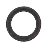 Pneu tubeless 9,5x2,50 vue de trois quarts montrant le profil cramponne