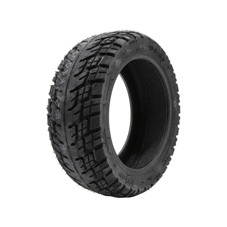 Pneu tubeless off-road 90/55-7 eWheel 11 pouces vue trois quarts, sculpture bloc profonde