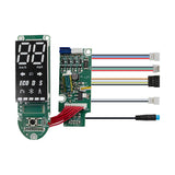 Gros plan display PCB Ninebot Max G2 — affichage 7 segments, modes ECO/D/S/Bluetooth, faisceau fils JST