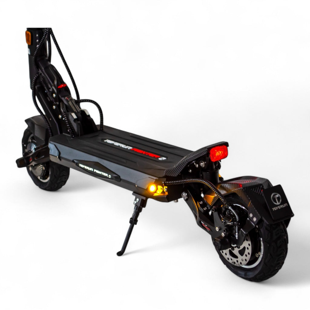 Teverun Fighter Mini Q - gros plan suspension avec accents orange signature Teverun
