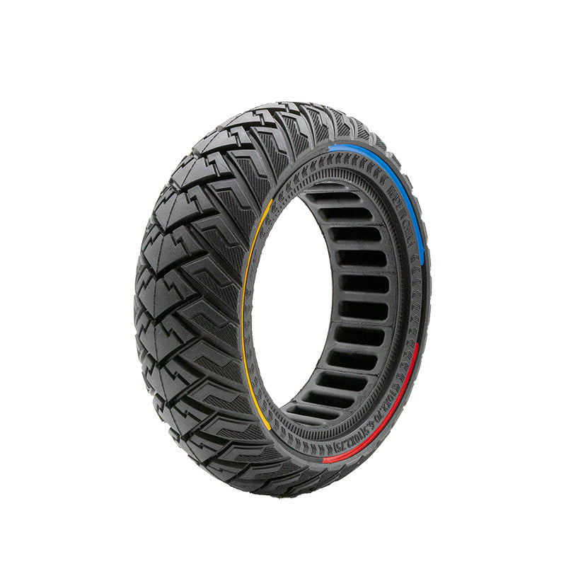 Pneu plein trottinette 10x2,75 tricolore vue 3/4 — bandes bleu jaune rouge, sculptures tout-terrain zigzag