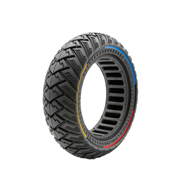 Pneu plein trottinette 10x2,75 tricolore vue 3/4 — bandes bleu jaune rouge, sculptures tout-terrain zigzag