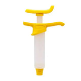 Syringe en plastique jaune et blanc pour kit purge frein trottinette électrique