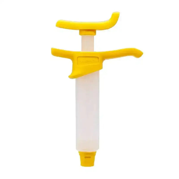 Syringe en plastique jaune et blanc pour kit purge frein trottinette électrique
